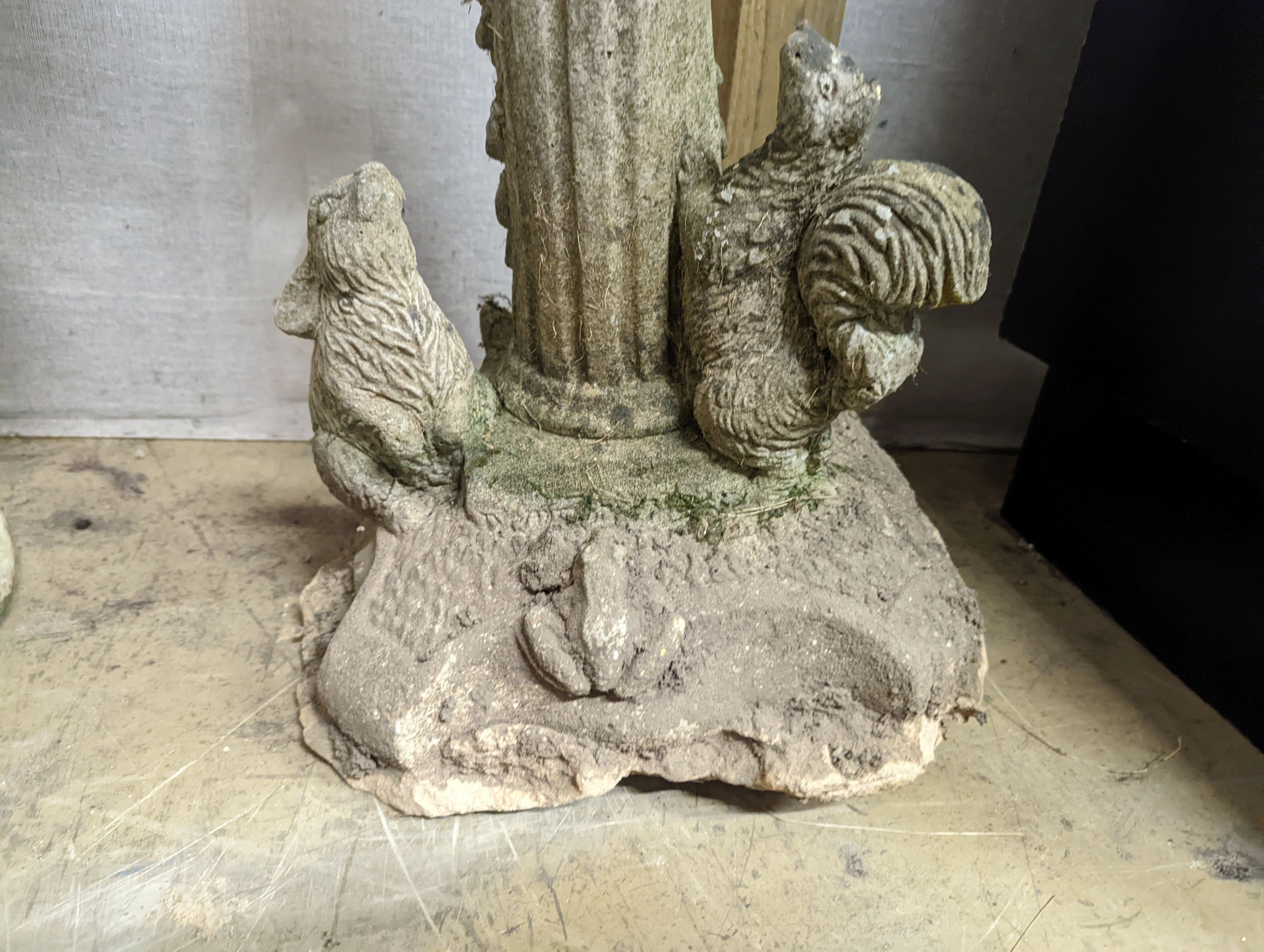 A reconstituted stone garden ornament of pan, height 82cm